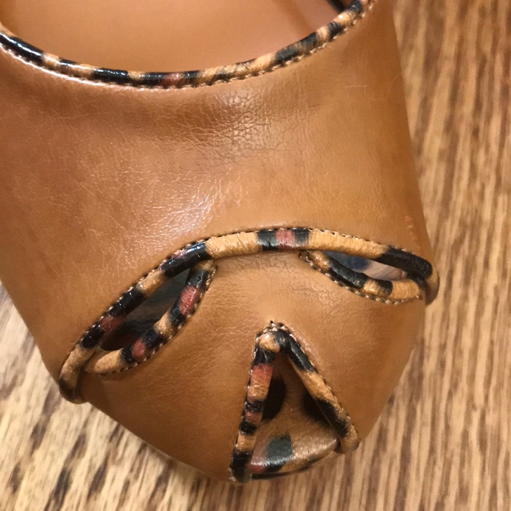 Animal print unique peep-toe 4 inch heels.